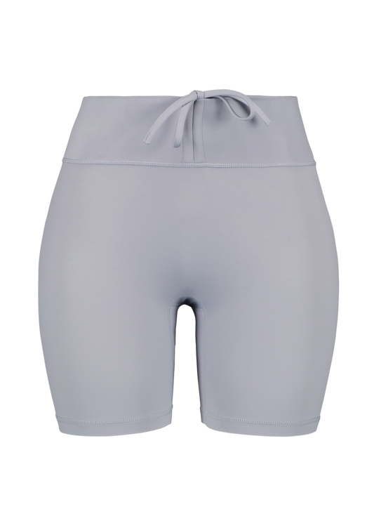 Light grey pocket gym shorts with adjustable waistband and a light scrunch butt front angle